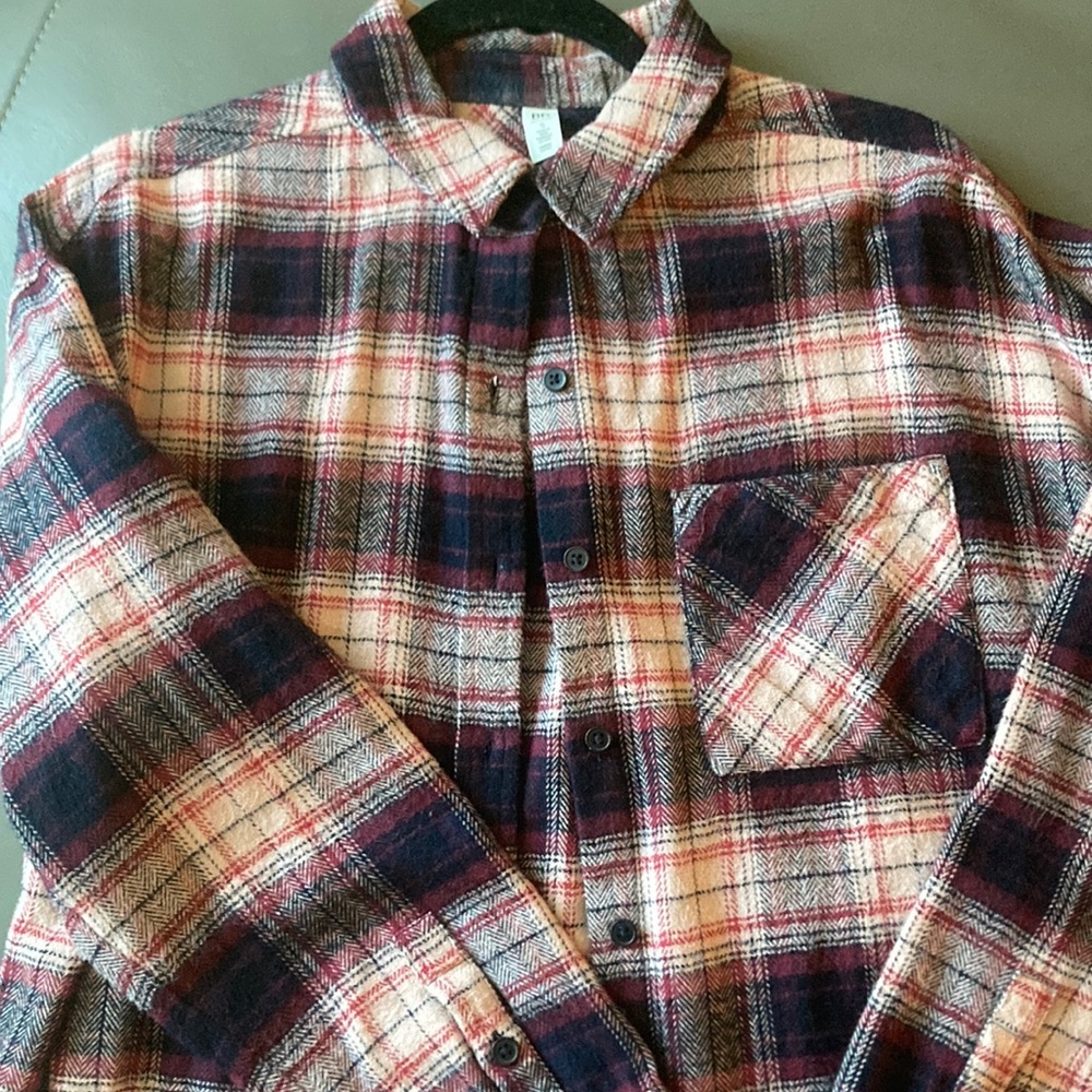 Multi-color lightweight shacket in shades of red and blue.